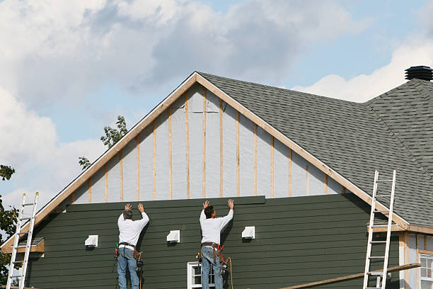 Professional Siding Contractor technician working in Logan, WV